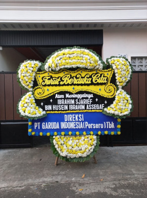 Papan Bunga Duka di Yatamo