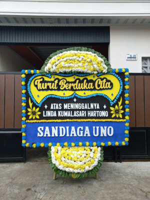 Papan Bunga Duka di Yatamo